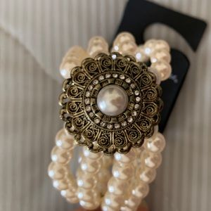 Multi strand pearl elastic antique style bracelet